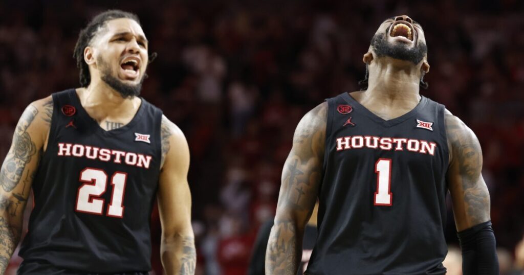 Mar 2, 2024; Norman, Oklahoma, USA; Houston Cougars guard Jamal Shead (1) and guard Emanuel Sharp (21) celebrate after Jamal scored a basket against the Oklahoma Sooners during the second half at Lloyd Noble Center.