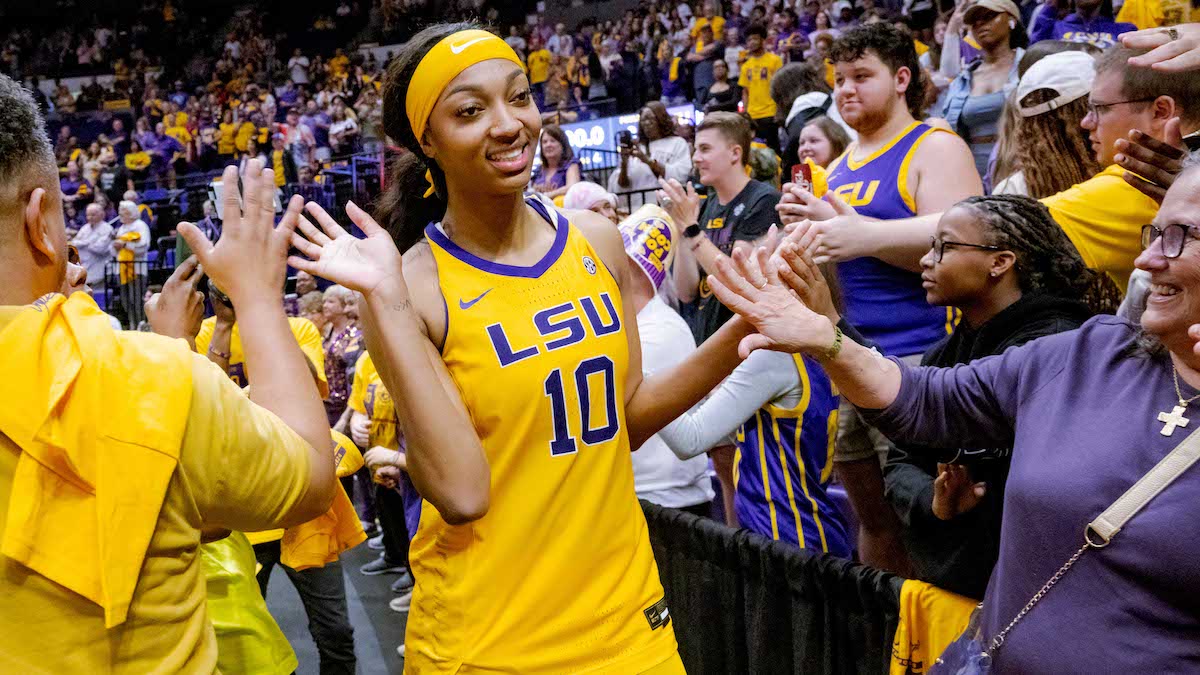 Angel Reese celebrates earning SEC Player of the Year honors