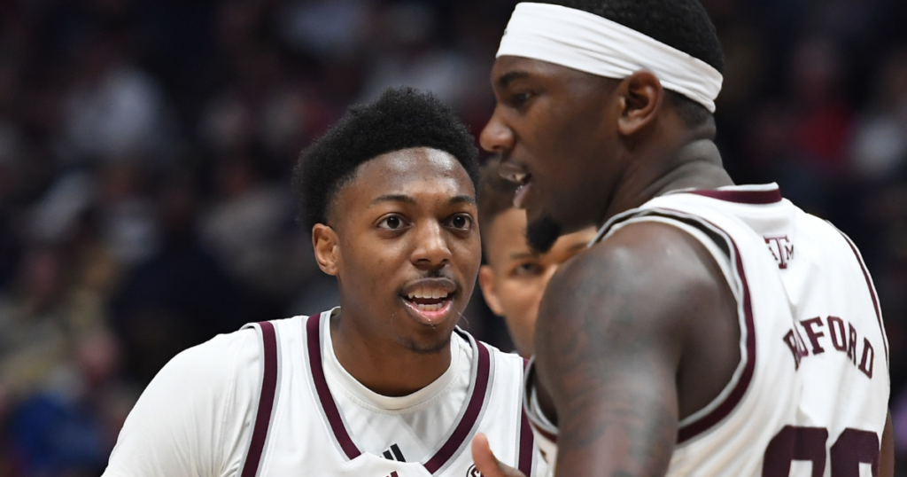 Texas A&M Aggies guard Wade Taylor IV (4) celebrates with guard Tyrece Radford (23) after a basket during the first half against the Vanderbilt Commodores at Bridgestone Arena