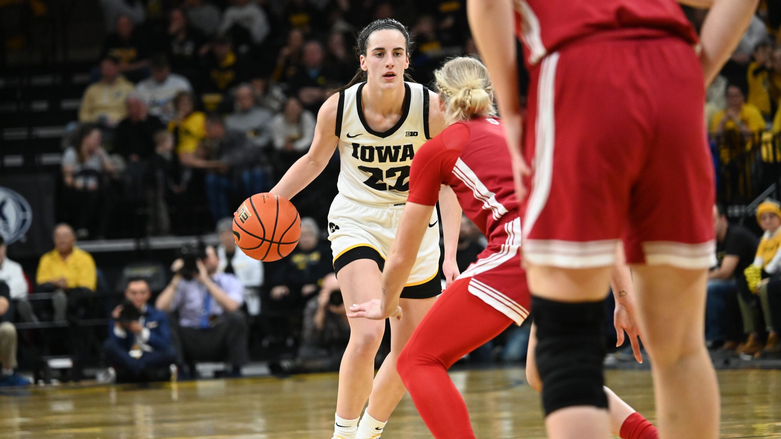 Caitlin Clark surveys the Indiana defense. (Photo by Dennis Scheidt)