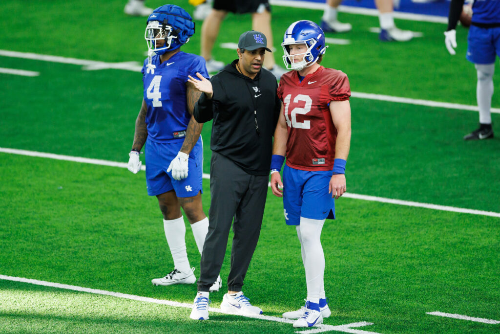 DeaMonte Trayanum. Brock Vandagriff. BushHamdan at Kentucky spring practice #1. (Elliott Hess | UK Athletics)