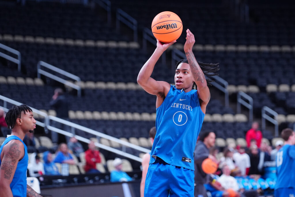 Kentucky Wildcats guard Rob Dillingham (0) shoots the ball during the NCAA first round practice session at PPG Paints Arena - Gregory Fisher-USA TODAY Sports