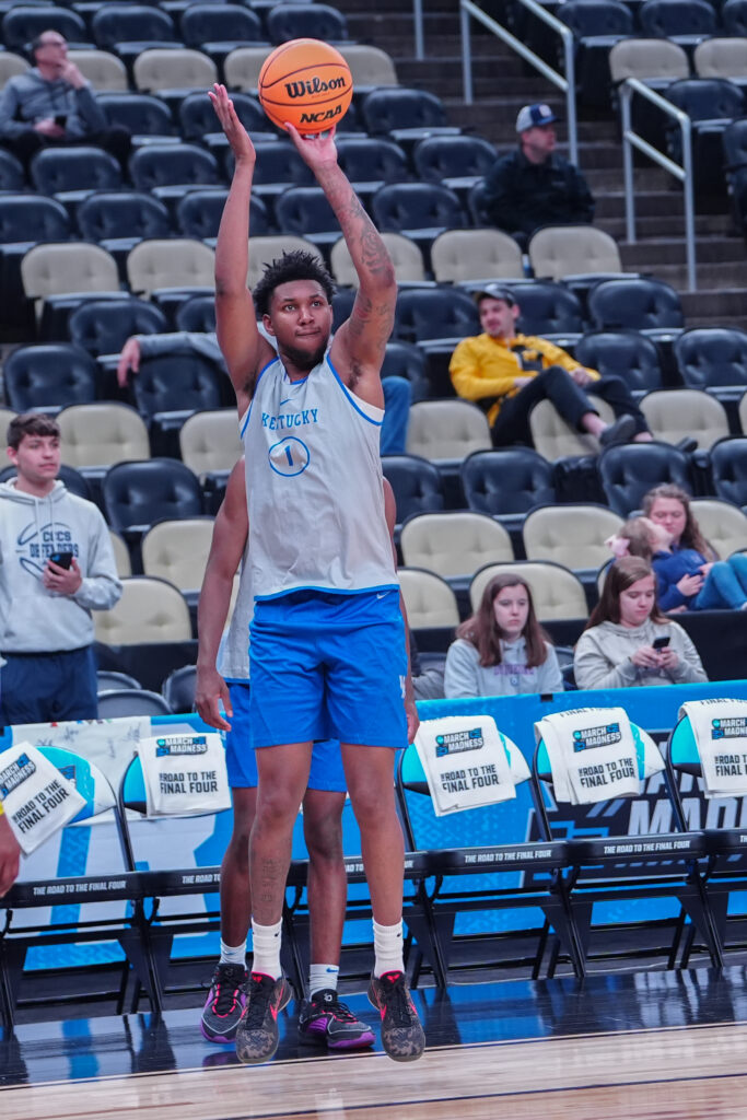 Kentucky Wildcats guard Justin Edwards (1) shoots the ball during the NCAA first round practice session at PPG Paints Arena - Gregory Fisher-USA TODAY Sports