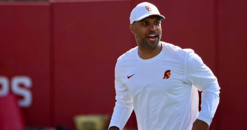 USC defensive coordinator D'Anton Lynn coaches during a spring ball practice with the Trojans