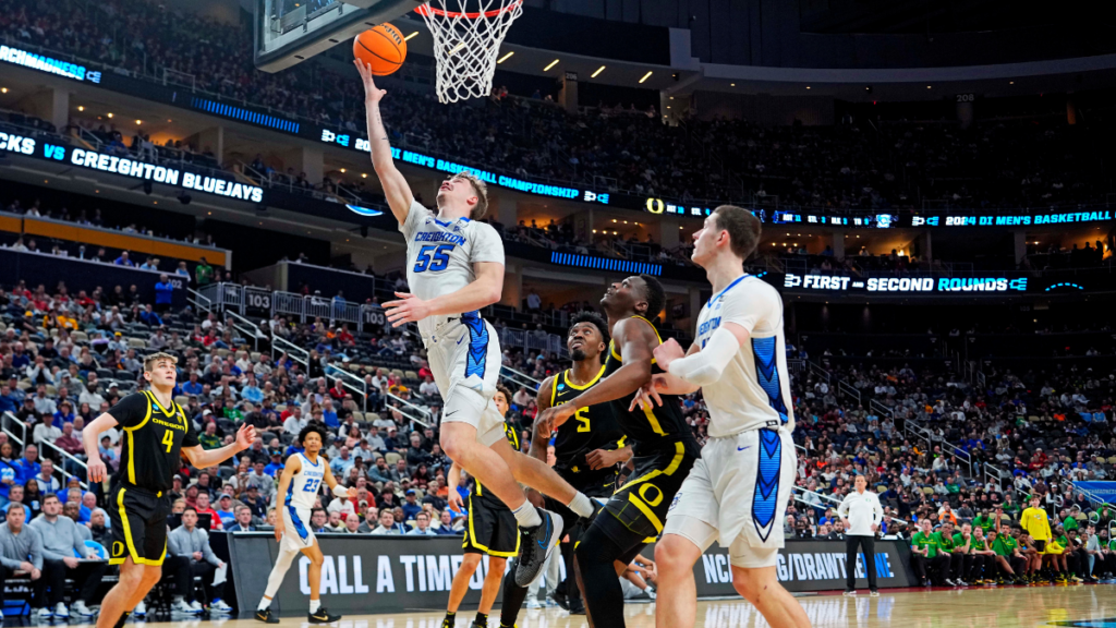 Creighton's Baylor Scheierman lays it in against Oregon (Gregory Fisher / USA Today Sports)