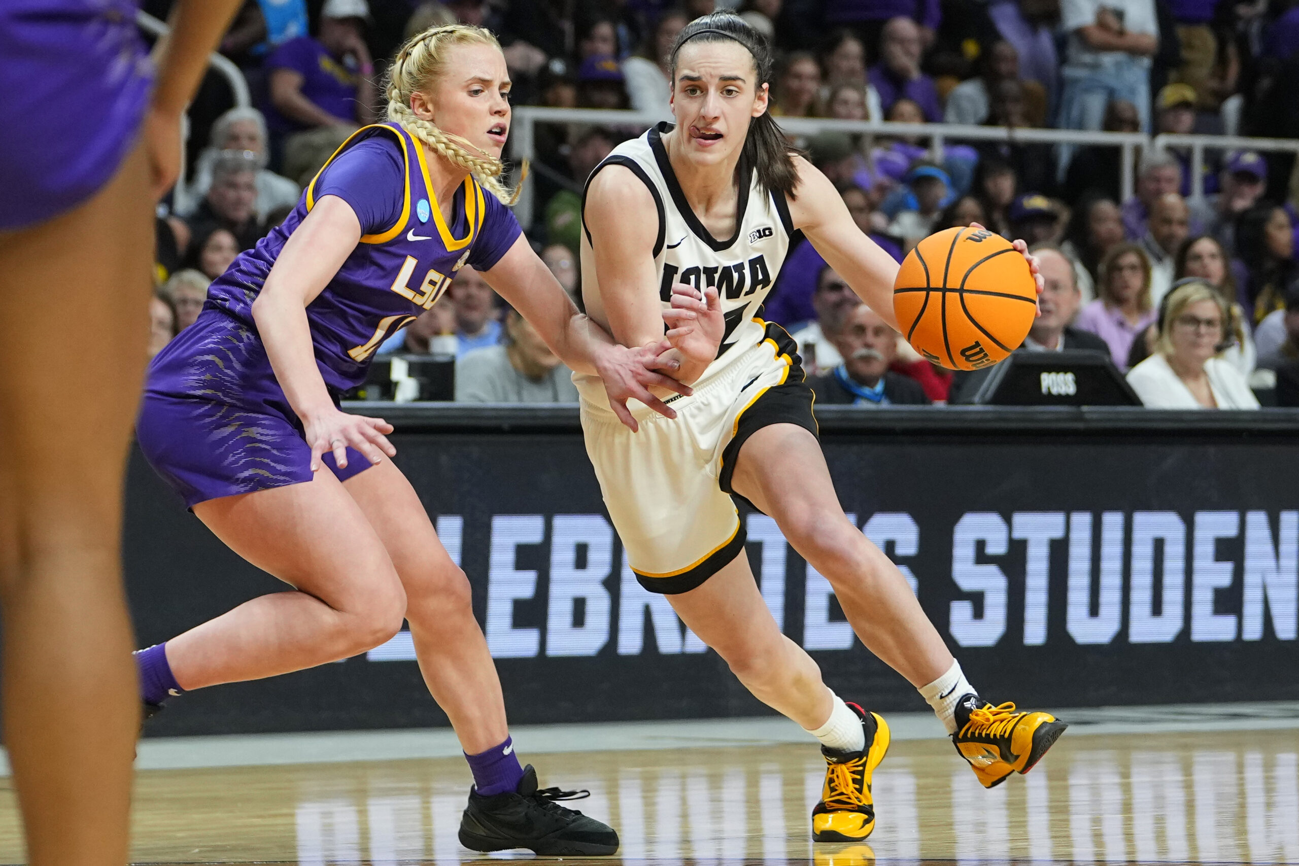 Hailey Van Lith shrugs in defeat following Caitlin Clark three-pointer ...