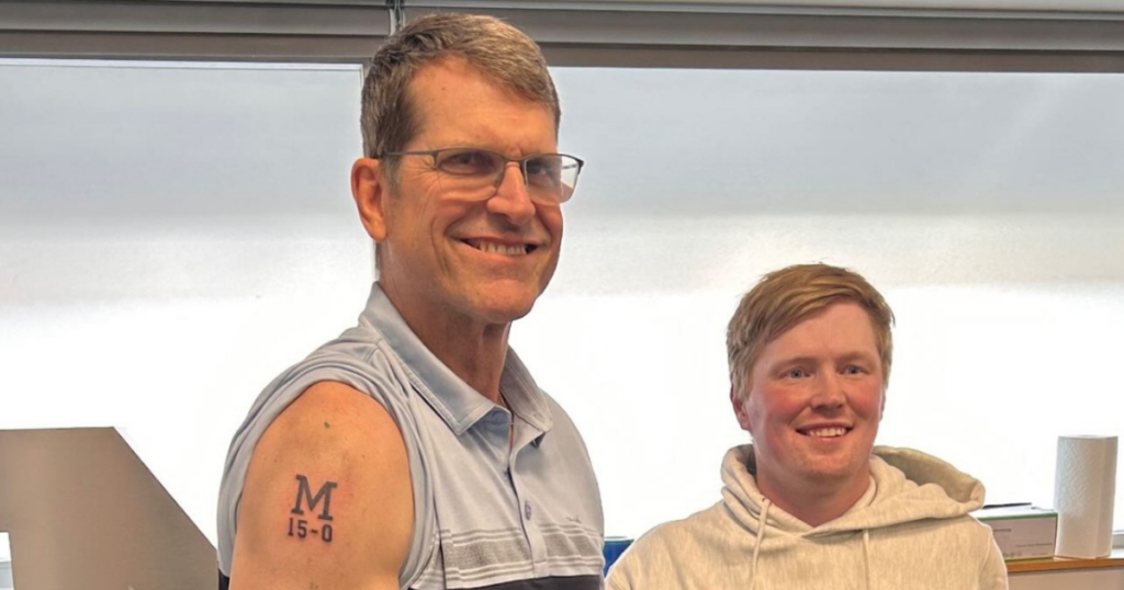Michigan Wolverines football head coach Jim Harbaugh received his 15-0 tattoo. (Photo by Robbie Emery)