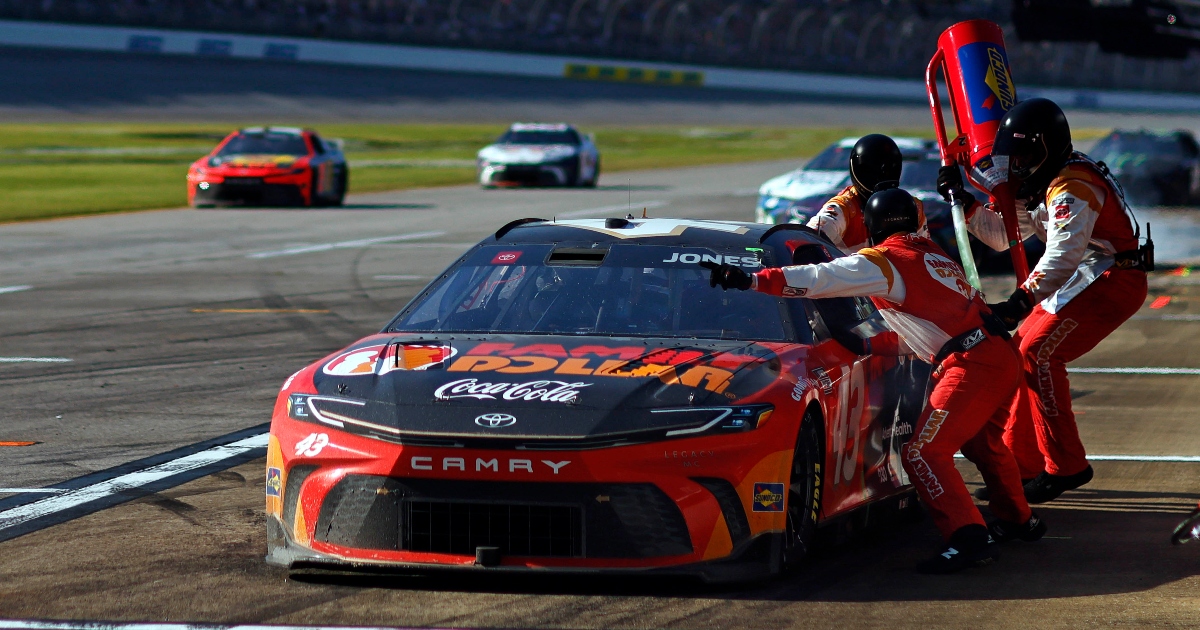 Erik Jones ends his pit stop sideways at a standstill after being hit by Christopher Bell