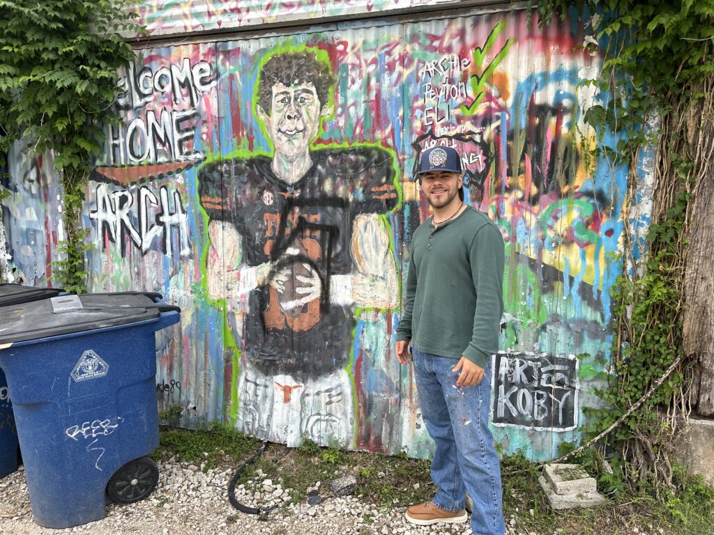 Austin artist Koby Hyde and his mural of Arch Manning