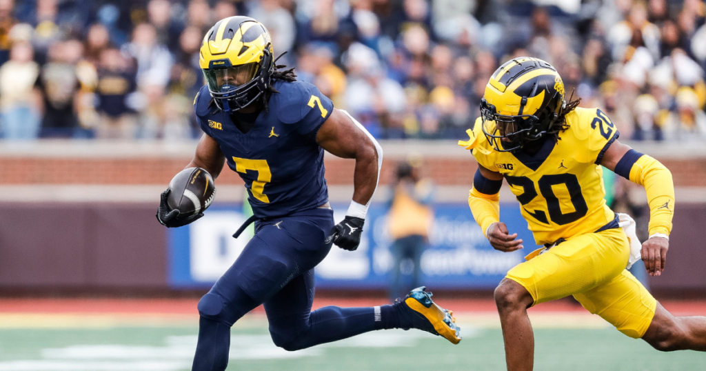 Michigan Wolverines football running back Donovan Edwards was ran down by cornerback Jyaire Hill in the 2024 spring game. (Photo by Junfu Han / USA TODAY NETWORK)