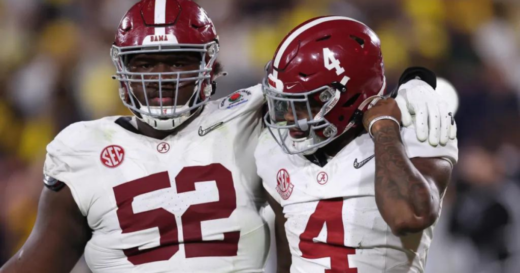 Alabama OL Tyler Booker and QB Jalen Milroe