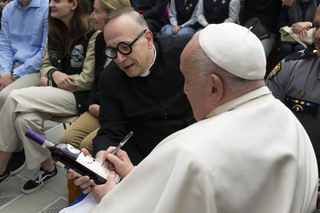 Father Jim Sichko presents Pope Francis with a bottle of Willett Bourbon - Photo courtesy of Jim Sichko