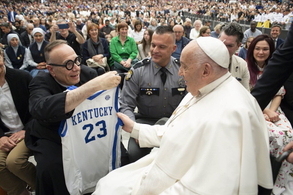 Father Jim Sichko presents Pope Francis with a Mark Pope Kentucky jersey - Photo courtesy of Jim Sichko