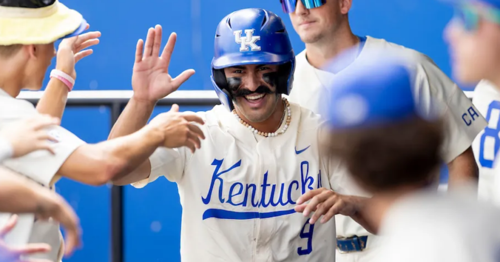 Kentucky Baseball's Nick Lopez is congratulated by his teammates - Chet White, UK Athletics