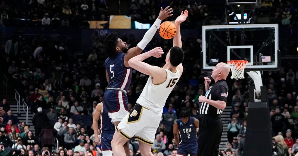 Mar 17, 2023; Columbus, Ohio, USA; Purdue Boilermakers center Zach Edey (15) takes the opening tipoff against Fairleigh Dickinson Knights forward Ansley Almonor (5) during the first round of the NCAA men‚Äôs basketball tournament at Nationwide Arena. Mandatory Credit: Adam Cairns-The Columbus Dispatch Basketball Ncaa Men S Basketball Tournament