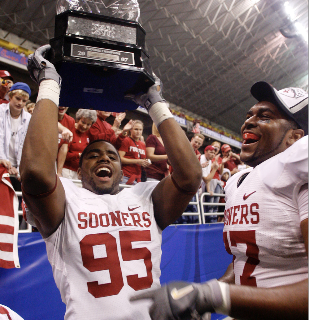 Sherrone Moore (right) celebrates winning the 2007 Big 12 title. (Jerry Lai/USA Today)