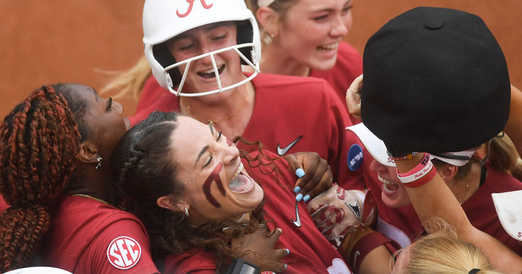 Alabama catcher Riley Valentine celebrates her grand slam vs. Tennessee