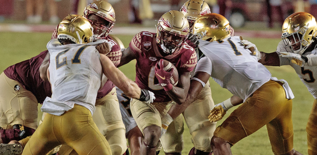 Former Florida Stateback Jashaun Corbin breaks through the Notre Dame defense during the 2021 game. (Logan Stanford/Special to Warchant)