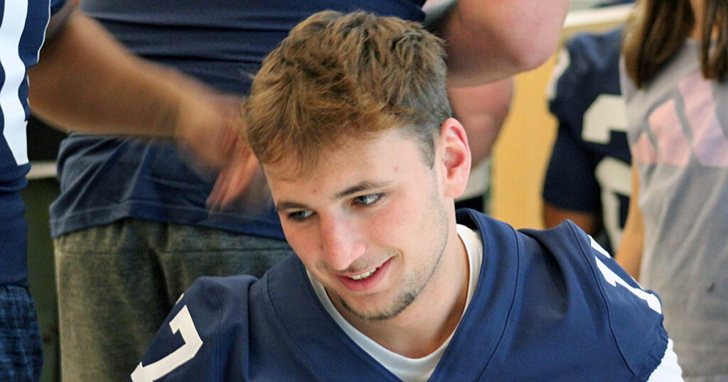 Ethan Grunkemeyer smiles while talking to a patient during the Lions' annual trip to Penn State Hershey Children's Hospital. (Pickel/BWI)