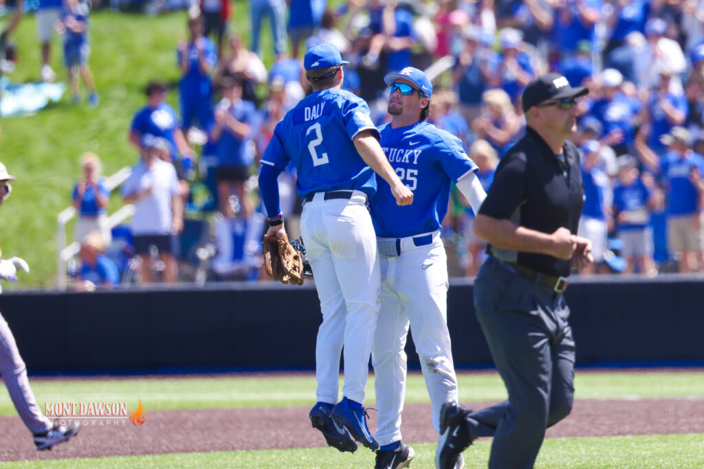 Kentucky baseball players celebrating | Photo by Mont Dawson