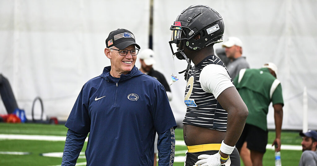 Linebacker commit Dayshaun Burnett with linebackers coach and defensive coordinator Tom Allen (Photo: Thomas Frank Carr/BWI) 