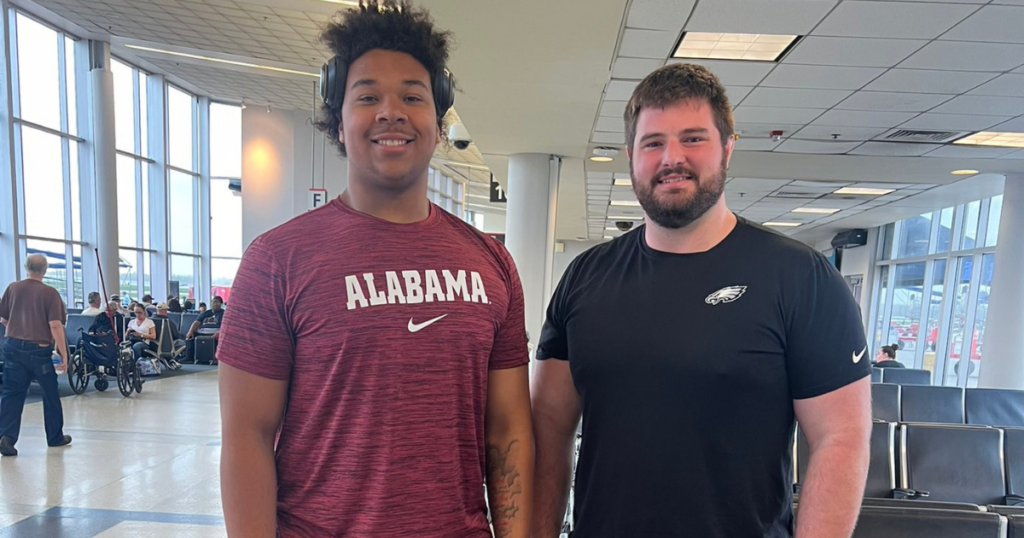 Michael Carroll with former Alabama OL Landon Dickerson
