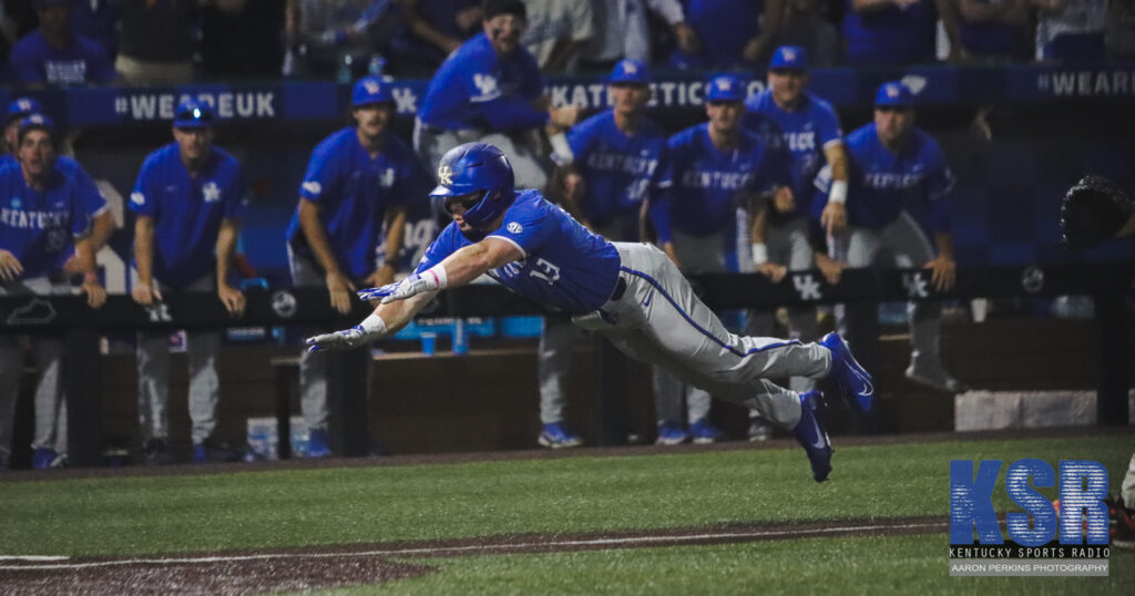 Kentucky outfielder Nolan McCarthy dives toward home plate in the Super Regional - Aaron Perkins, Kentucky Sports Radio