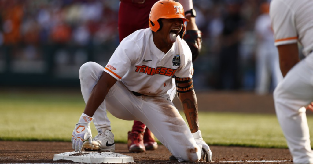 Christian Moore celebrates after hitting a triple in the College World Series. Credit: UT Athletics