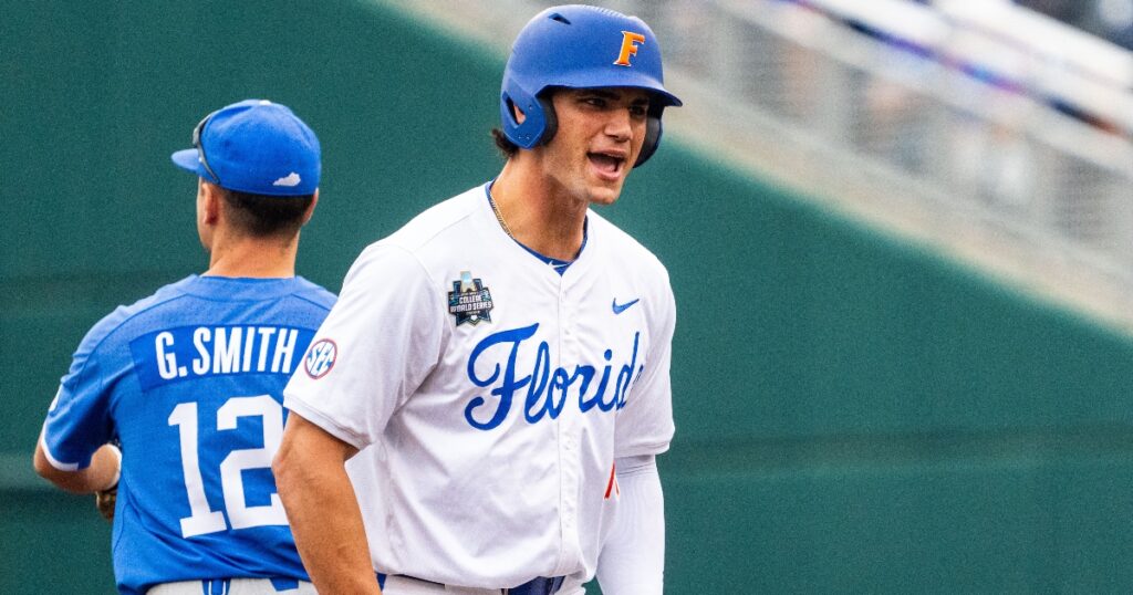 florida-jac-caglianone-trades-signed-gloves-picture-fan-record-breaking-75th-home-run-ball-college-world-series-Dylan Widger-USA TODAY Sports