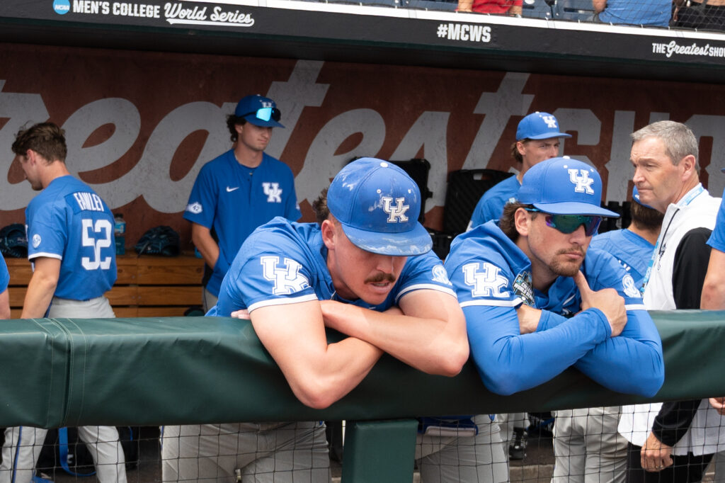 Kentucky Wildcats pitcher Cameron O'Brien (10) and first baseman Ryan Nicholson (25) look over the field after the loss against the Florida Gators at Charles Schwab Field Omaha - Steven Branscombe-USA TODAY Sports