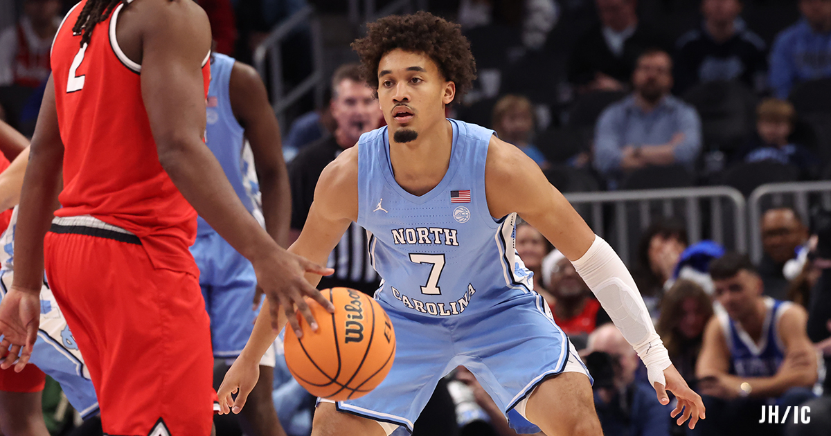 WATCH: UNC prematurely storms court on Seth Trimble game-winner in wild finish vs. No. 4 Duke