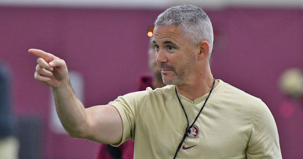 Florida State coach Mike Norvell points in approval at practice. (Ben Spicer/Warchant)