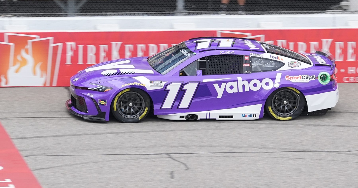 Denny Hamlin turns from 2nd place to the front to thunderous applause from the Michigan crowd