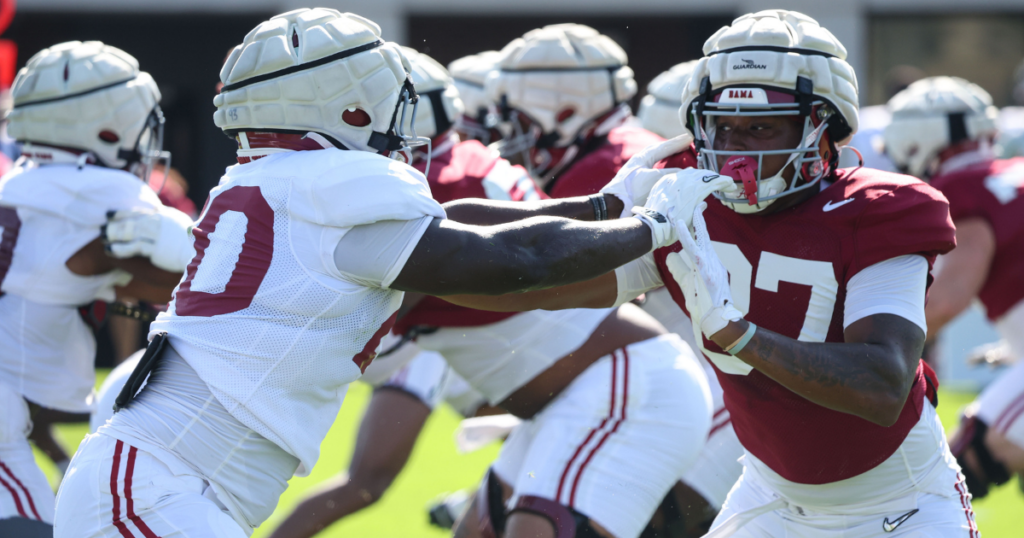 Alabama DL Jah-Marien Latham and TE Danny Lewis