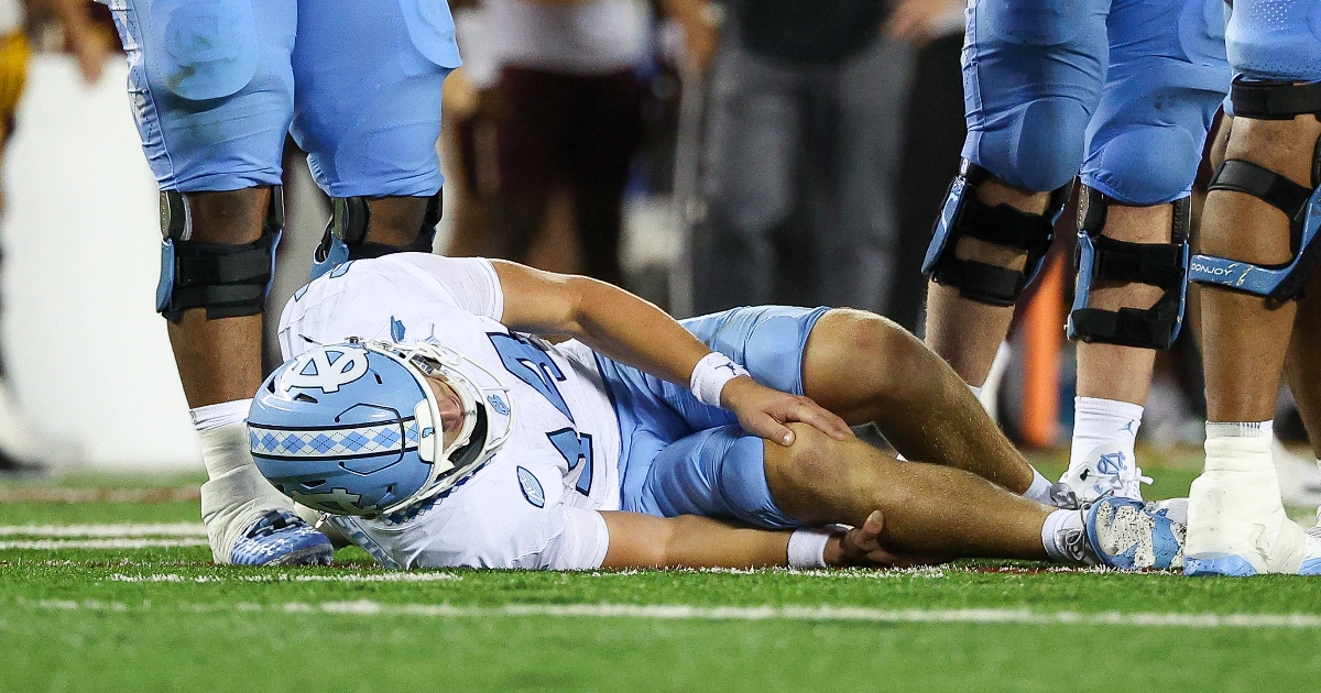 FOX Sports analyst Brock Huard chokes up watching mother of Max Johnson cry after injury