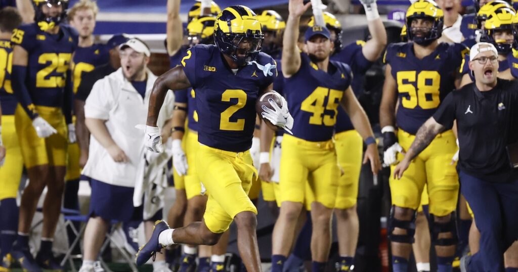 Aug 31, 2024; Ann Arbor, Michigan, USA; Michigan Wolverines defensive back Will Johnson (2) runs the ball after he makes an interception in the second half against the Fresno State Bulldogs at Michigan Stadium. Mandatory Credit: Rick Osentoski-USA TODAY Sports