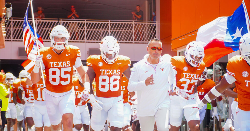 Texas HC Steve Sarkisian leads the Longhorns out of the tunnel against Colorado State