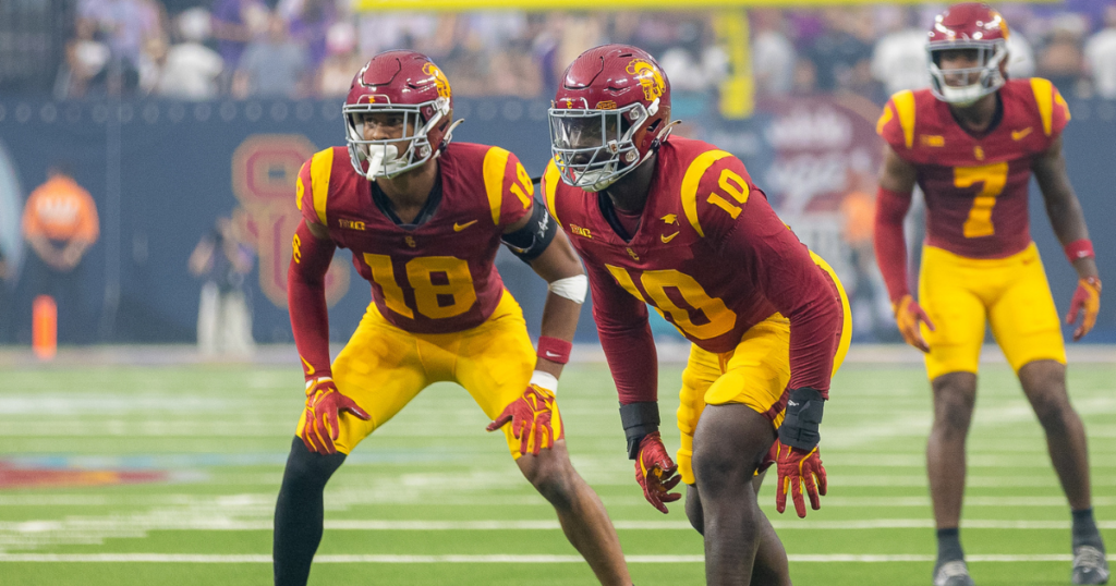 USC defenders Eric Gentry, Jamil Muhammad and Kamari Ramsey prepare for the snap during a game against LSU in Las Vegas