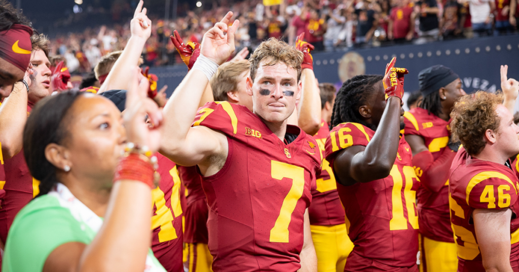 USC quarterback Miller Moss and his Trojans teammates celebrate after a win against the LSU Tigers