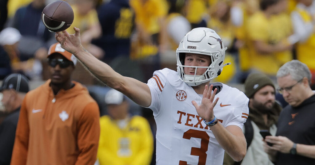 Texas QB Quinn Ewers warms up vs. Michigan