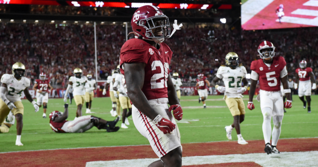 Sep 7, 2024; Tuscaloosa, Alabama, USA; Alabama Crimson Tide running back Jam Miller (26) celebrates after a touchdown run against the South Florida Bulls at Bryant-Denny Stadium. Alabama won 42-16. Mandatory Credit: Gary Cosby Jr.-Imagn Images © Gary Cosby Jr.-Imagn Images