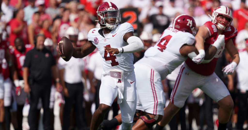 Sep 14, 2024; Madison, Wisconsin, USA; Alabama Crimson Tide quarterback Jalen Milroe (4) throws a pass during the first quarter against the Wisconsin Badgers at Camp Randall Stadium. Mandatory Credit: Jeff Hanisch-Imagn Images