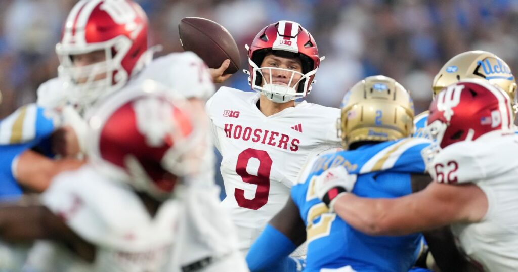 Indiana quarterback Kurtis Rourke attempts a pass in a win at UCLA in Week 3. (Kirby Lee-Imagn Images)