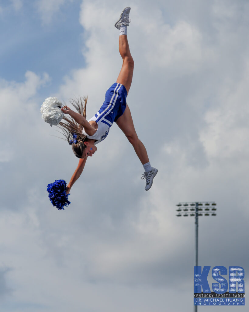 Kentucky cheerleader soars through the air during Kentucky vs. Ohio  - Dr. Michael Huang, Kentucky Sports Radio