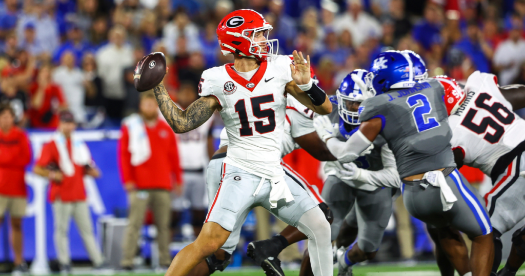 Sep 14, 2024; Lexington, Kentucky, USA; Georgia Bulldogs quarterback Carson Beck (15) drops back to pass against the Kentucky Wildcats during the first quarter at Kroger Field. Mandatory Credit: Carter Skaggs-Imagn Images