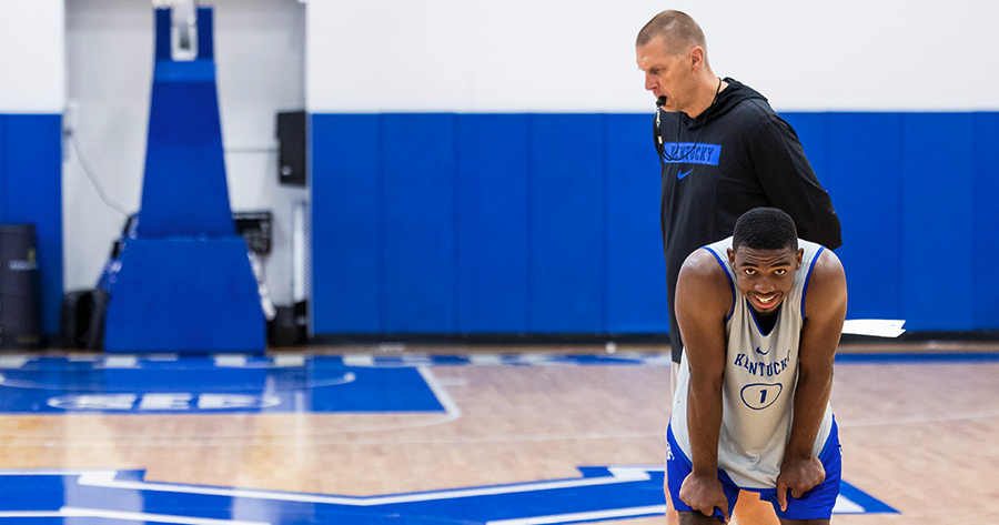 Mark Pope stands with Lamont Butler at Kentucky basketball practice (Photo: UK Athletics)