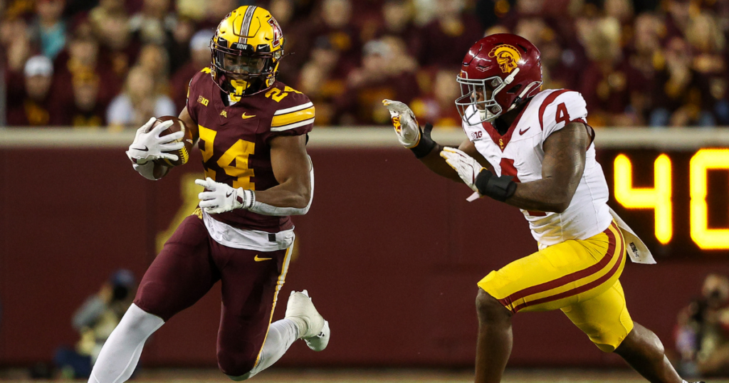 Minnesota Golden Gophers running back Marcus Major (24) runs the ball as USC Trojans linebacker Easton Mascarenas-Arnold (4) defends during the second half at Huntington Bank Stadium