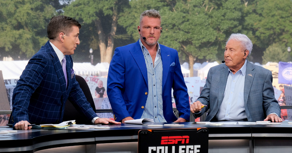 Lee Corso receives congratulations from Pat McAfee and Rece Davis on ESPN College GameDay