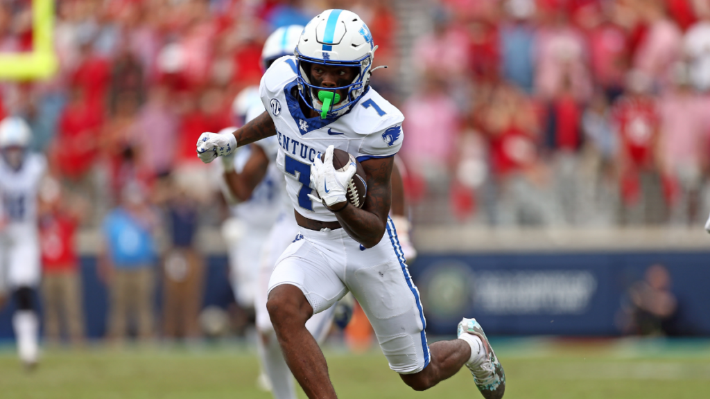 Sep 28, 2024; Oxford, Mississippi, USA; Kentucky Wildcats wide receiver Barion Brown (7) runs after a catch for a first downduring the second half at Vaught-Hemingway Stadium. Mandatory Credit: Petre Thomas-Imagn Images