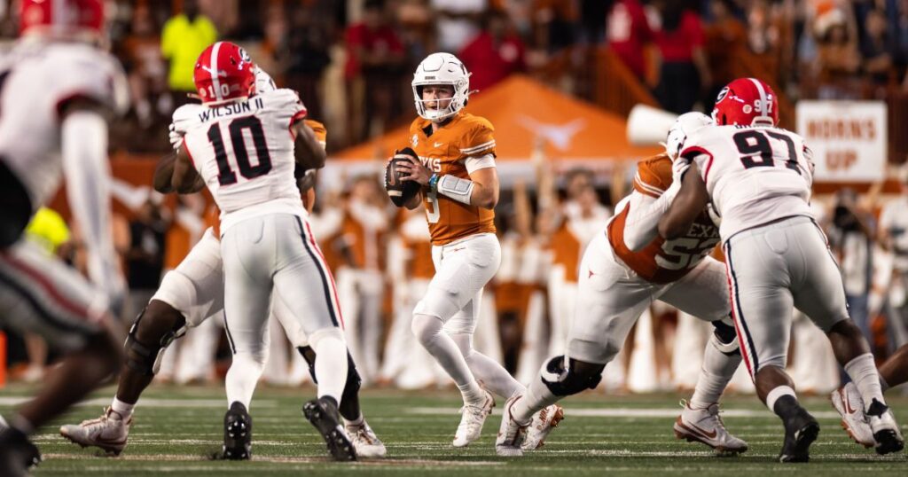 Texas quarterback Quinn Ewers drops back to pass during a 30-15 loss to Georgia in Week 8. (Brett Patzke-Imagn Images)